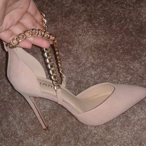Nude Suede heels with crisscross gold chains